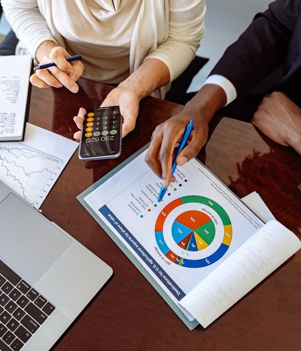 Corporate office environment with financial analysis tools