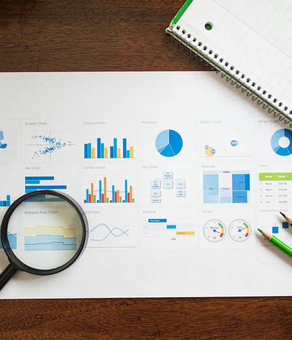 Professional financial consulting session with charts and graphs
